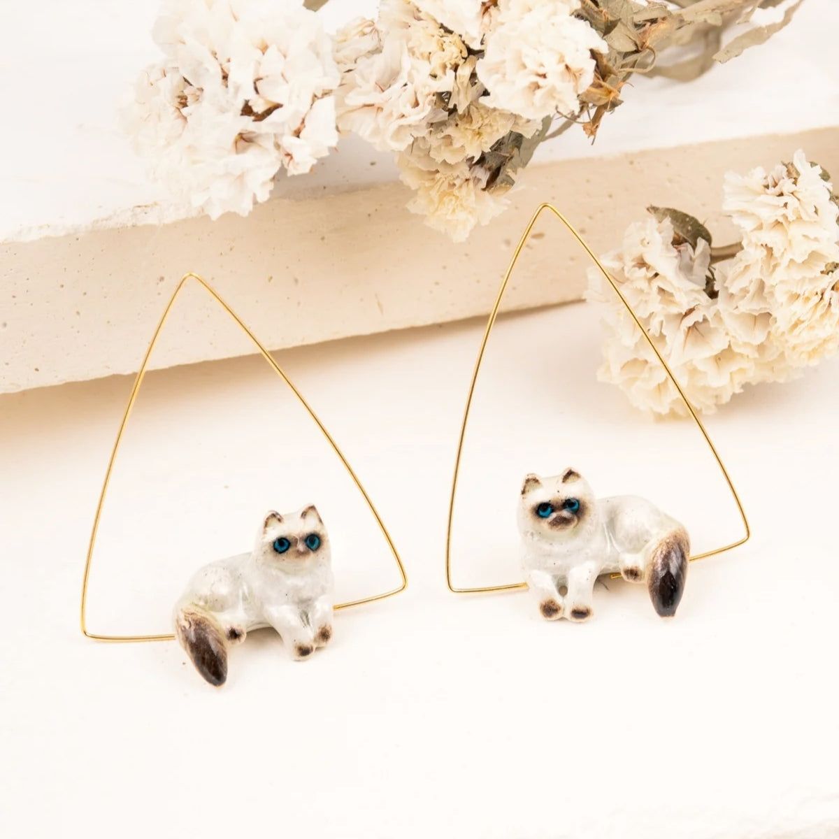 Buy Nach Bijoux Lying Siamese Cat Triangle Earrings Online for Women | Free 3-Hour Delivery in Dubai | Boom & Mellow UAE