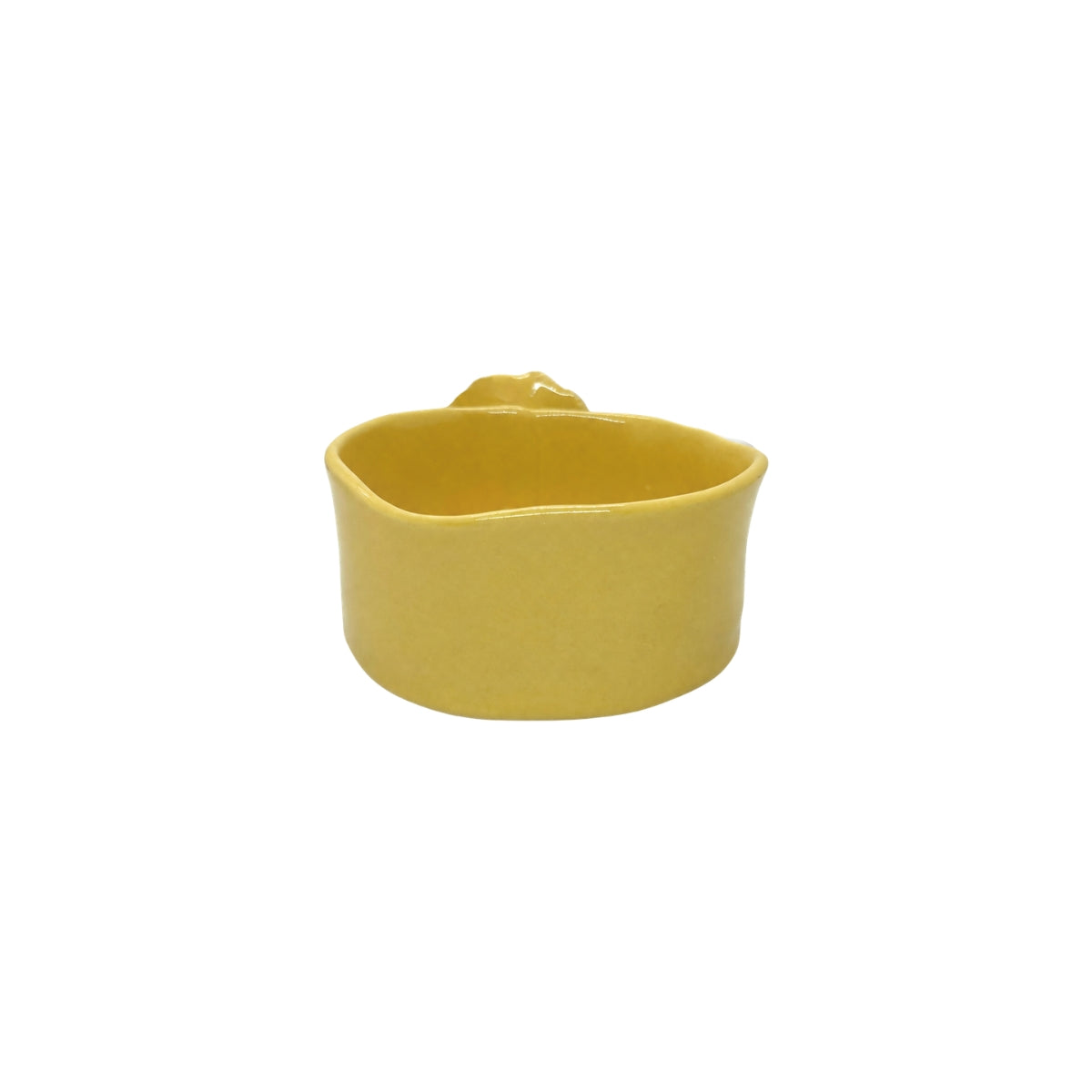 Back view of Nayla's Ceramics warm yellow wavy ceramic bowl highlighting the handcrafted shape