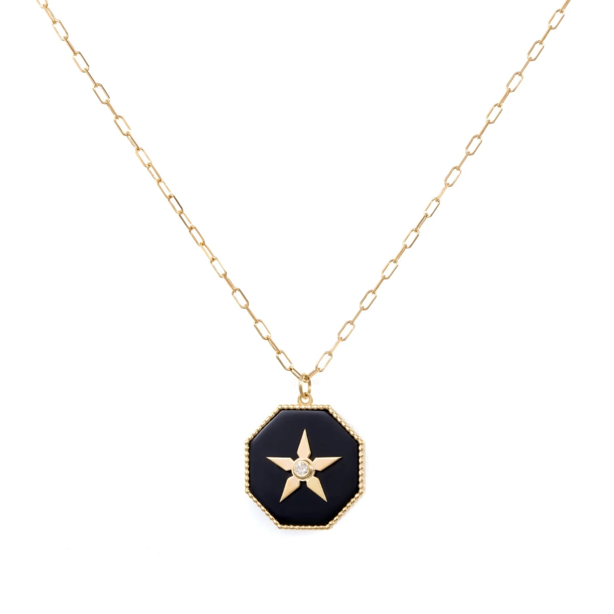 Orchid Jewelry 18k yellow gold necklace featuring an octagonal black onyx pendant with a gold star center set with a diamond