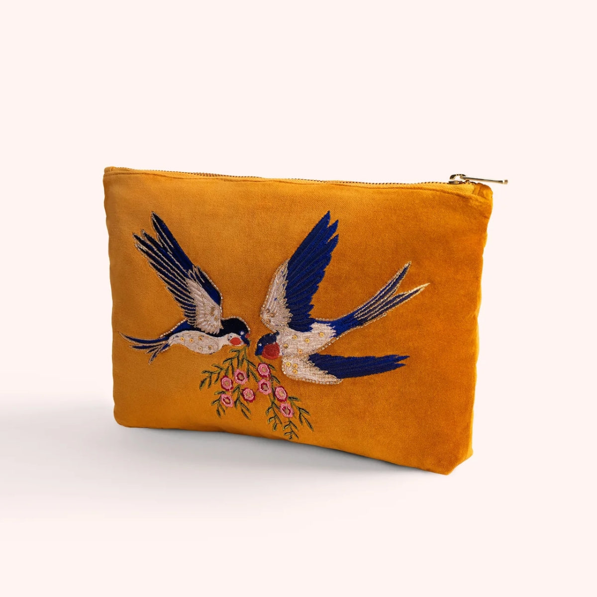 Mustard velvet zip pouch hand embroidered and beaded with two swallows in flight carrying pink blossoms