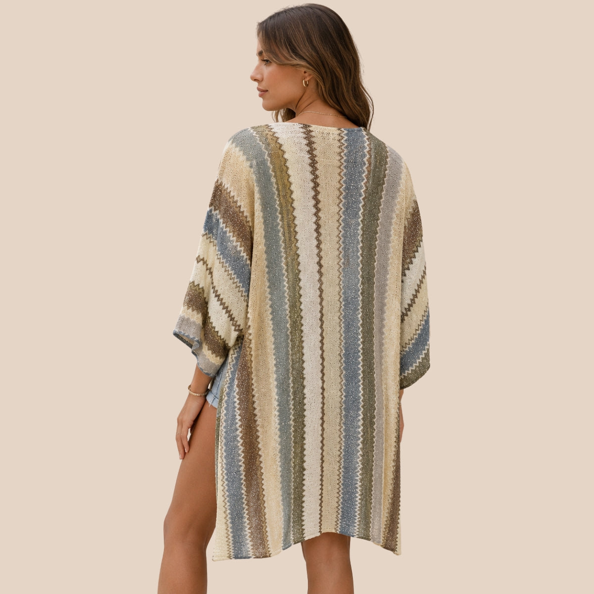 Back view of You & Eye earthy sage green and mustard chevron open-knit short kimono showing high side slit detail
