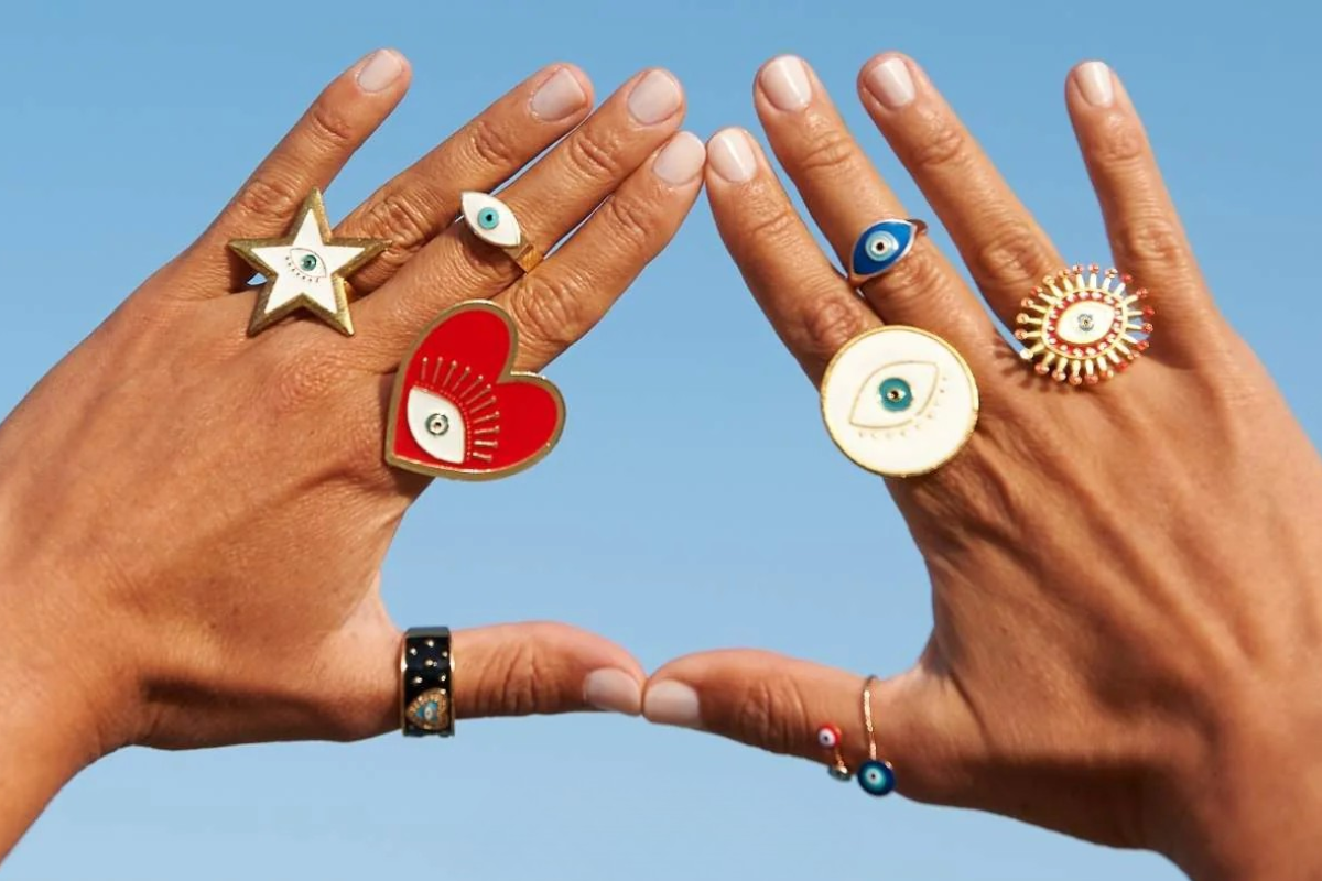 Colorful evil eye rings and jewelry inspired by a symbol of protection