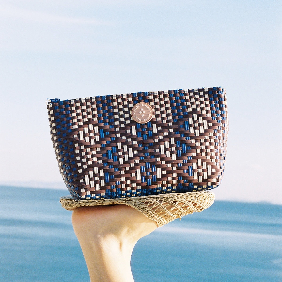 Sorbet Island Blue Woven Clutch Bag