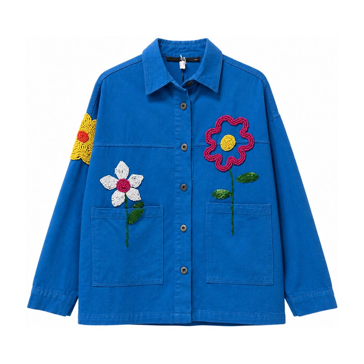 Flat lay of a blue button front jacket with hand beaded flowers on the chest and sleeve, twin patch pockets, collared neckline, and long sleeves, showcasing detailed beadwork craftsmanship