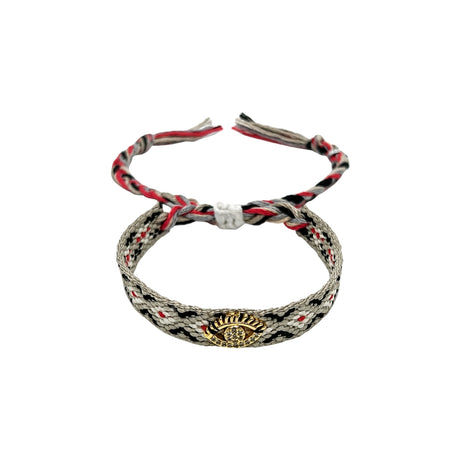 Woven friendship bracelet in grey black and red geometric pattern with gold evil eye charm and crystal detail, adjustable pull cord closure