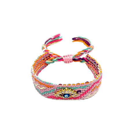 Woven friendship bracelet in pink orange and mint multicolor pattern with blue enamel evil eye charm and crystal detail, adjustable pull cord closure