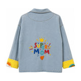 Flat back view of the Boutique Flo Super Mom Embroidered Light Denim Jacket, displaying the full "Super Mom" embroidery and yellow contrast cuffs