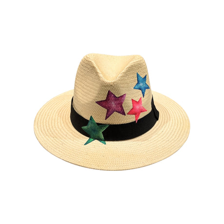 Three-quarter angled view of the City Girl hand-painted colored stars wide brim straw sun hat, highlighting the scattered star motif wrapping around the crown and the wide shading brim