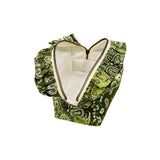 Open top view of the Cofin Paris Medium Louise Green Bandana Toiletry Bag displaying its spacious interior lined with white waterproof fabric.
