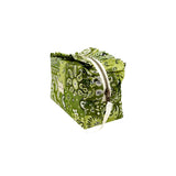 Side view of the Cofin Paris Medium Louise Green Bandana Toiletry Bag showing its ruffled top edge, metal zipper, and white ribbon pull.