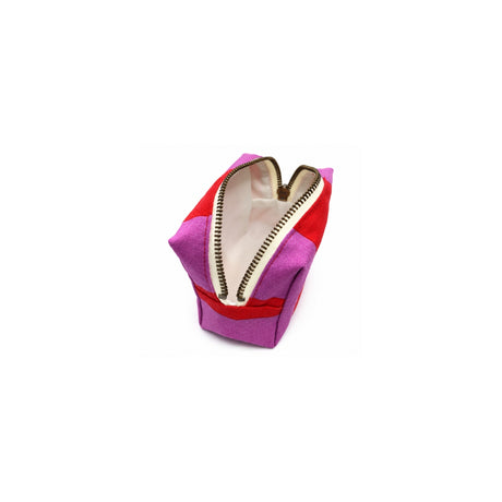 Open top view of the Cofin Paris Paola Striped pouch revealing its interior lined with waterproof fabric.