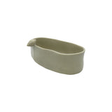 Angled view showing the interior and bird accent of Nayla's Ceramics grey ceramic oval snack bowl