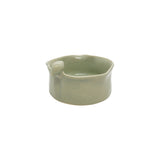 Angled view showing the interior and delicate bird accent of Nayla's Ceramics light green ceramic food serving bowl