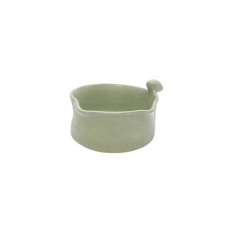 Side view showcasing the organic wavy rim and smooth glaze of Nayla's Ceramics light green birdie bowl
