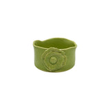 Front view of Nayla's Ceramics lime green wavy round ceramic bowl showing the multi-layered floral detail