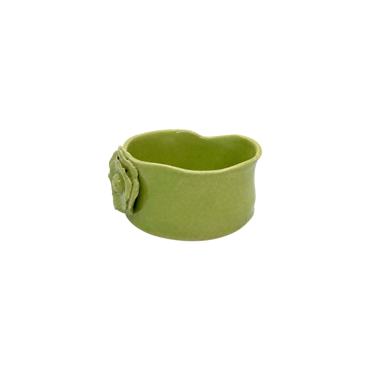Side profile of lime green ceramic bowl by Nayla's Ceramics showcasing the organic wavy rim design