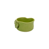 Side profile of lime green ceramic bowl by Nayla's Ceramics showcasing the organic wavy rim design