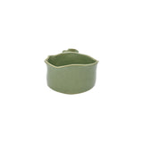 Back view of old green wavy edge handmade ceramic bowl by Nayla's Ceramics showing natural clay form