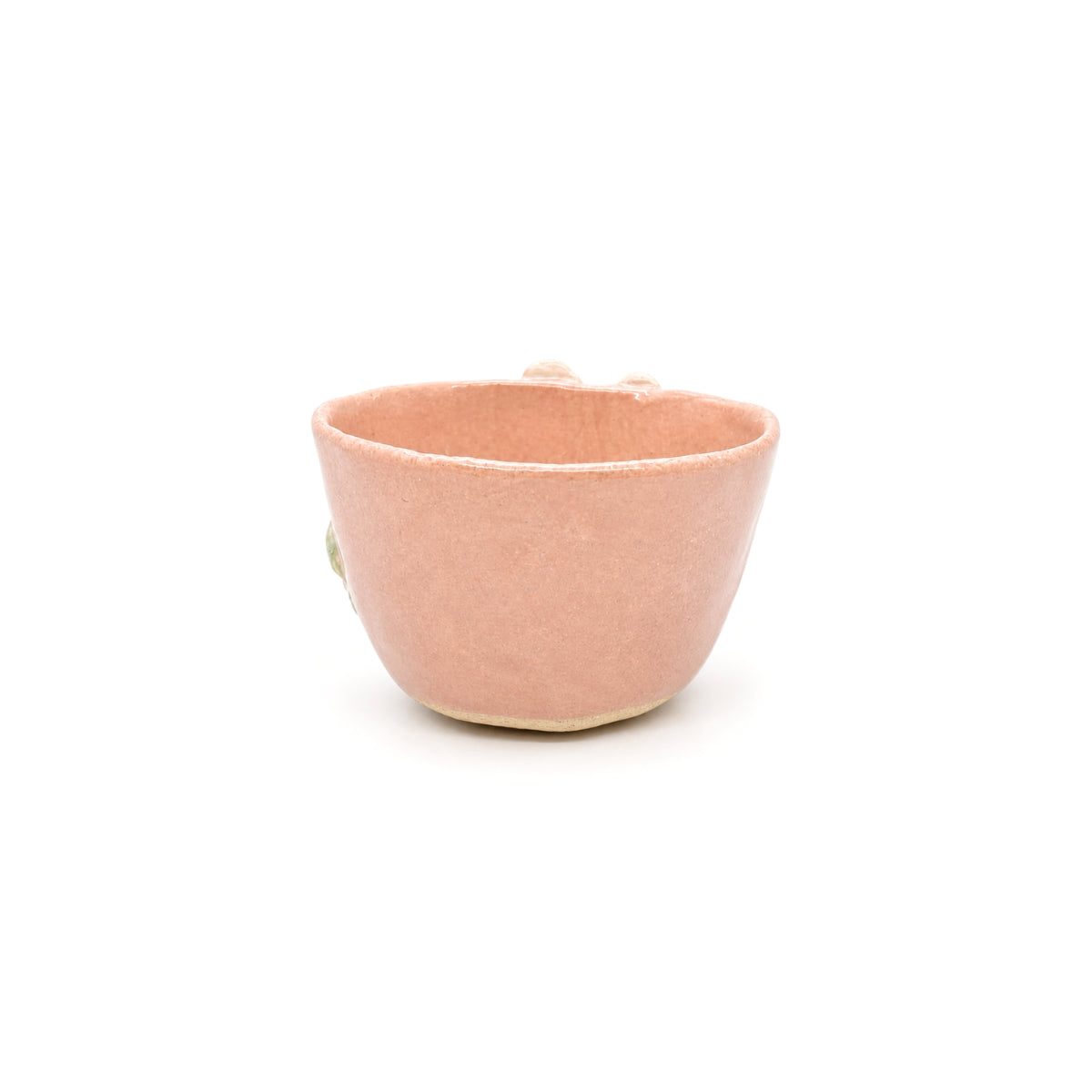 Back view of blush pink textured glaze handmade pottery bowl by Nayla's Ceramics