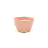 Back view of blush pink textured glaze handmade pottery bowl by Nayla's Ceramics