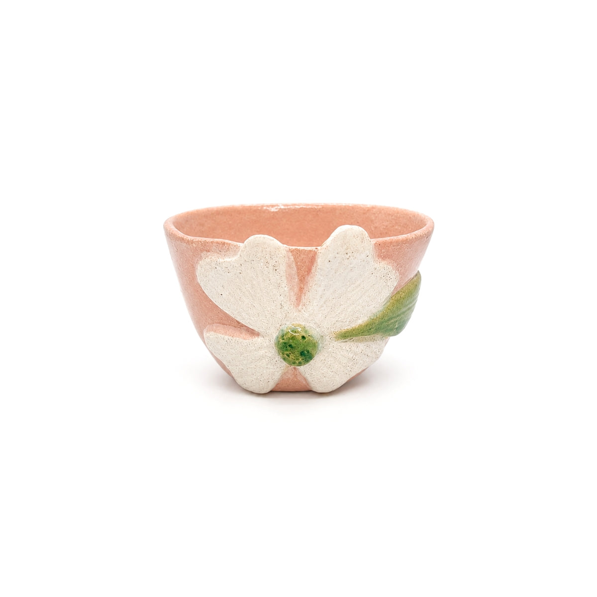 Front view of handcrafted pink clover ceramic bowl by Nayla's Ceramics featuring a raised off-white flower with a green center
