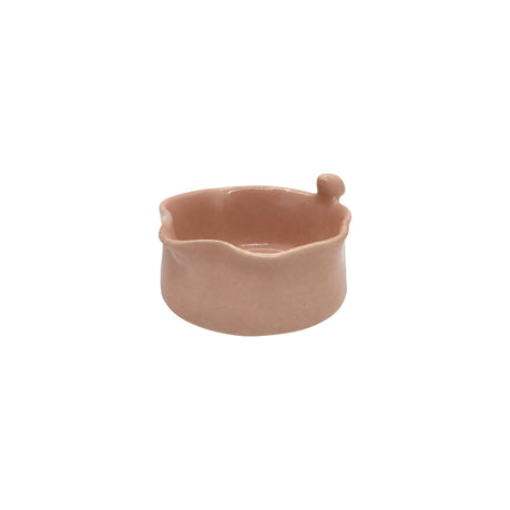 Angled view showing the interior and bird accent of Nayla's Ceramics pink ceramic serving bowl