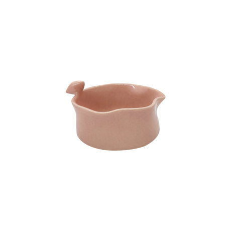 Front view of Nayla's Ceramics soft blush pink wavy round ceramic bowl featuring a sculpted ceramic bird on the rim
