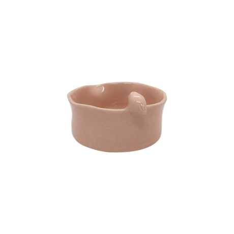 Side view showcasing the organic wavy rim and smooth blush pink glaze of Nayla's Ceramics birdie bowl