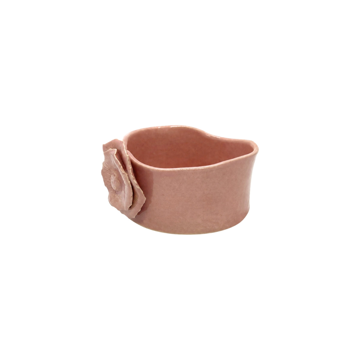 Side view of dusty rose handcrafted ceramic dish by Nayla's Ceramics showing the organic rim contour