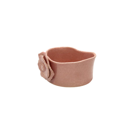 Side view of dusty rose handcrafted ceramic dish by Nayla's Ceramics showing the organic rim contour