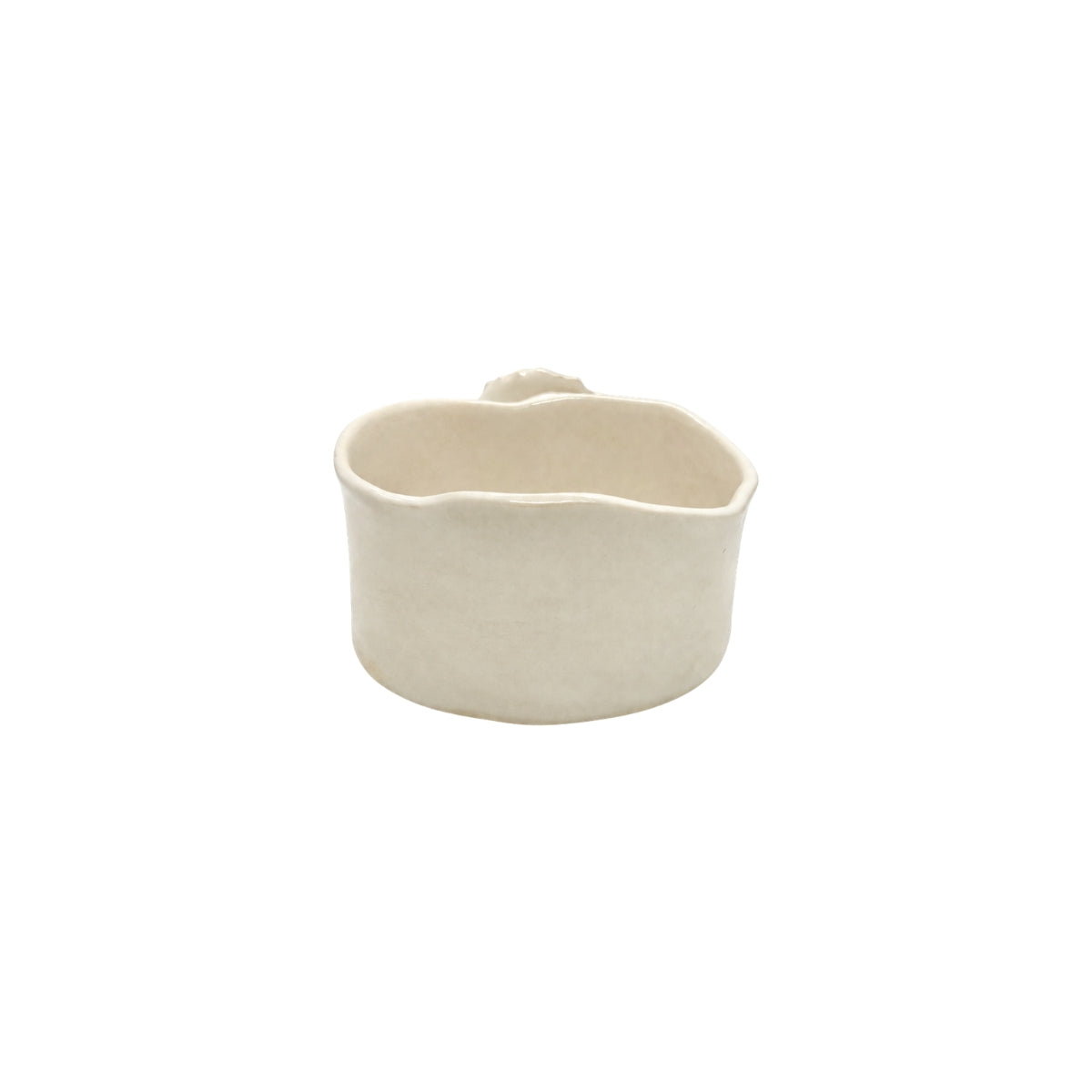 Back view of soft white wavy ceramic bowl by Nayla's Ceramics demonstrating hand-molded form