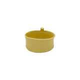 Angled view showing the interior and bird accent of Nayla's Ceramics yellow ceramic snack bowl