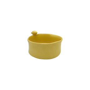 Front view of Nayla's Ceramics yellow wavy round ceramic bowl featuring a small sculpted bird on the rim