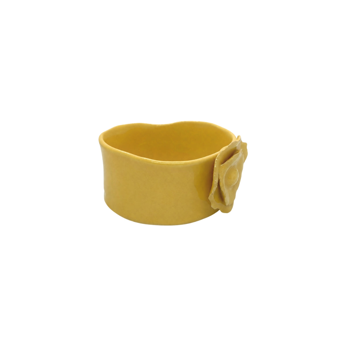 Angled view of Nayla's Ceramics yellow wavy round ceramic bowl showing the interior basin and layered petal applique