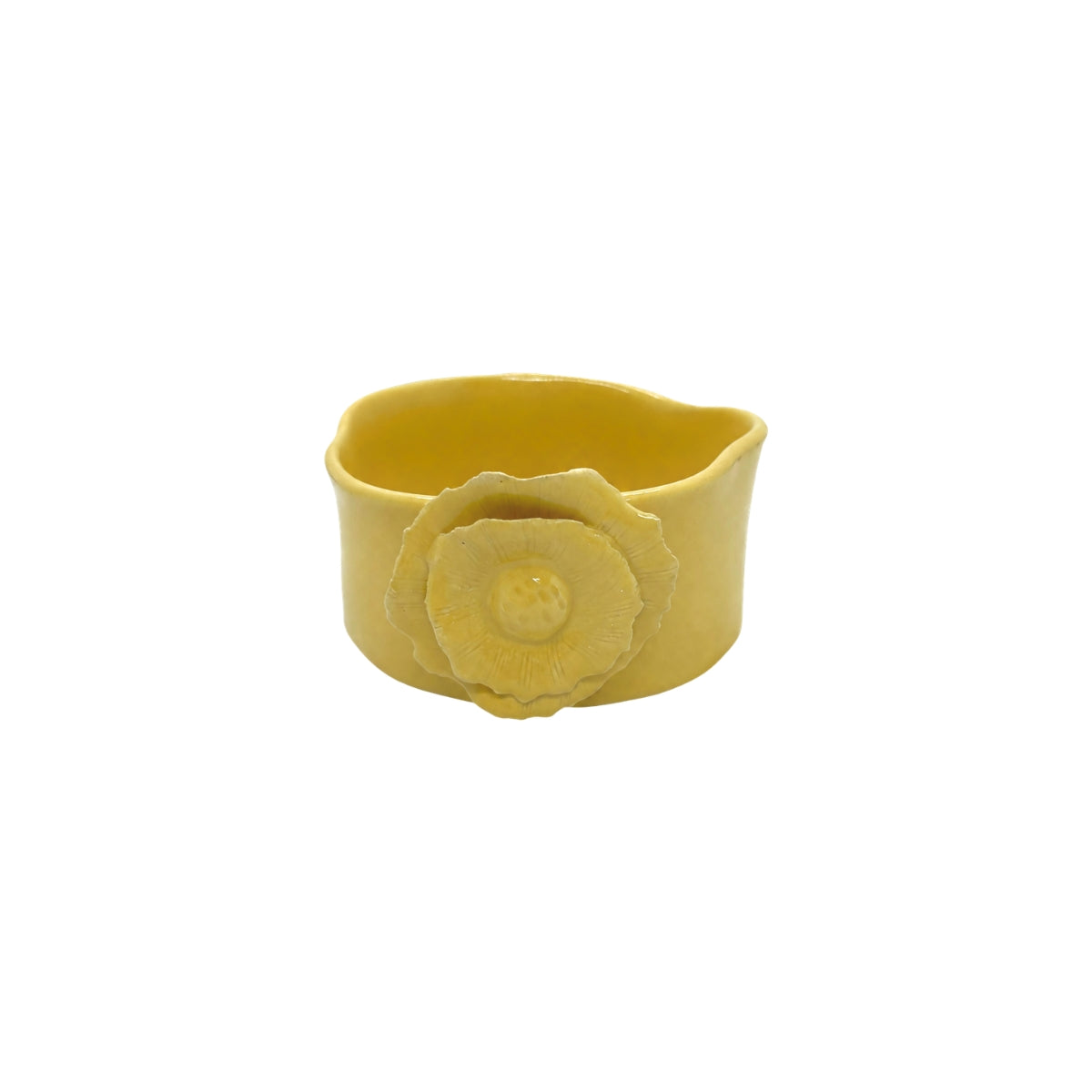 Front view of Nayla's Ceramics yellow wavy round ceramic bowl displaying the raised floral detail