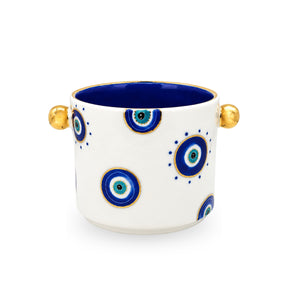 Front angle view of the Noorena Mallacio Evil Eye white ceramic vase showing hand-painted blue eye motifs and gold spherical handles.