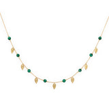 Orchid Jewelry 18k yellow gold choker featuring green malachite beads and dangling textured gold leaf charms
