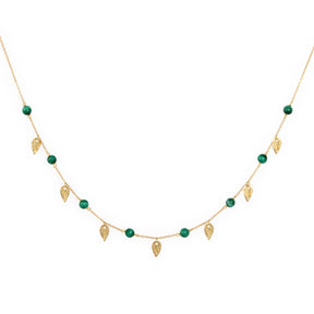Orchid Jewelry 18k yellow gold choker featuring green malachite beads and dangling textured gold leaf charms