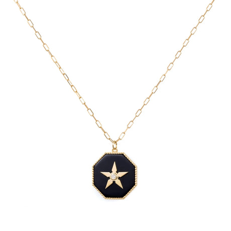 Orchid Jewelry 18k yellow gold necklace featuring an octagonal black onyx pendant with a gold star center set with a diamond