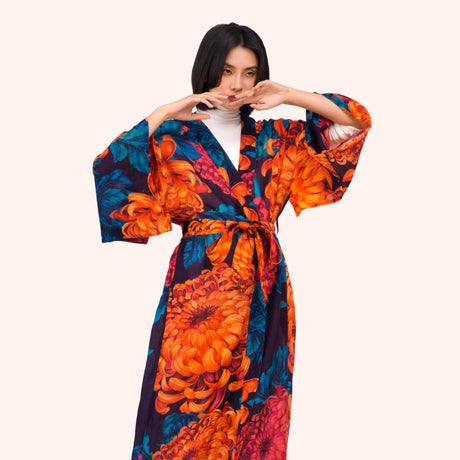 Close-up of the chrysanthemum print kimono gown, showing the waist tie and wide sleeve detail