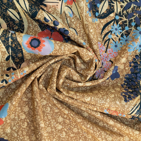 Close-up of the moss floral hedgerow scarf fabric, showing the crisp cotton poplin texture and layered floral print