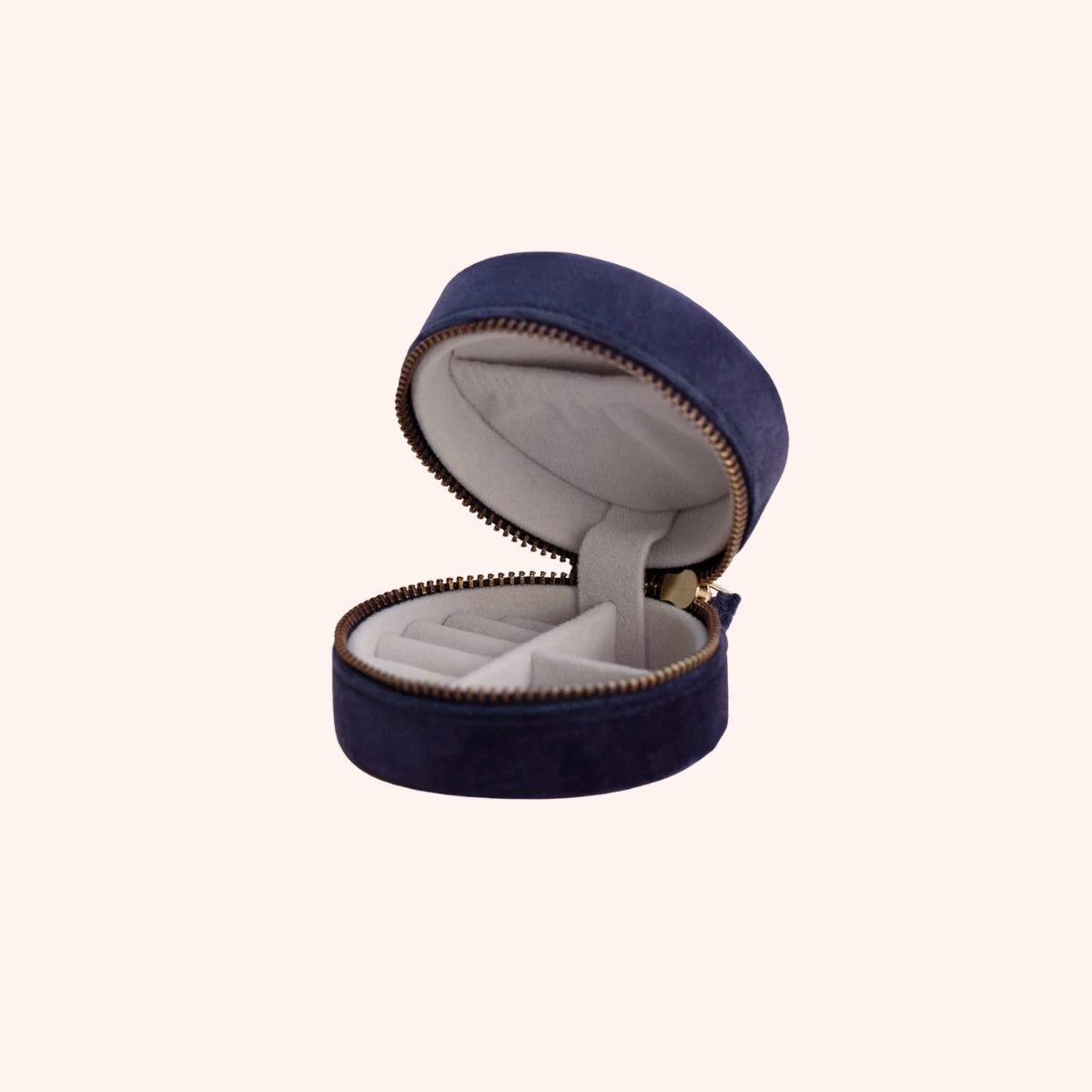 Interior view of the navy floral hedgerow jewelry box, showing the grey lining, ring slot, and compartments