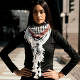 Back view of model wearing SEP black and white cotton keffiyeh scarf styled as a full headwrap