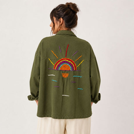 Olive green embroidered jacket with hand stitched sunrise and rainbow design on back, relaxed fit cotton twill jacket
