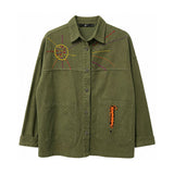 Olive green button down jacket with embroidered sunburst detail and textured orange pocket, flat lay product shot