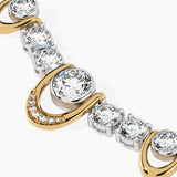 Close up of bezel set and prong set round lab-grown diamonds in 14k yellow gold open curved links, fine jewelry detail shot