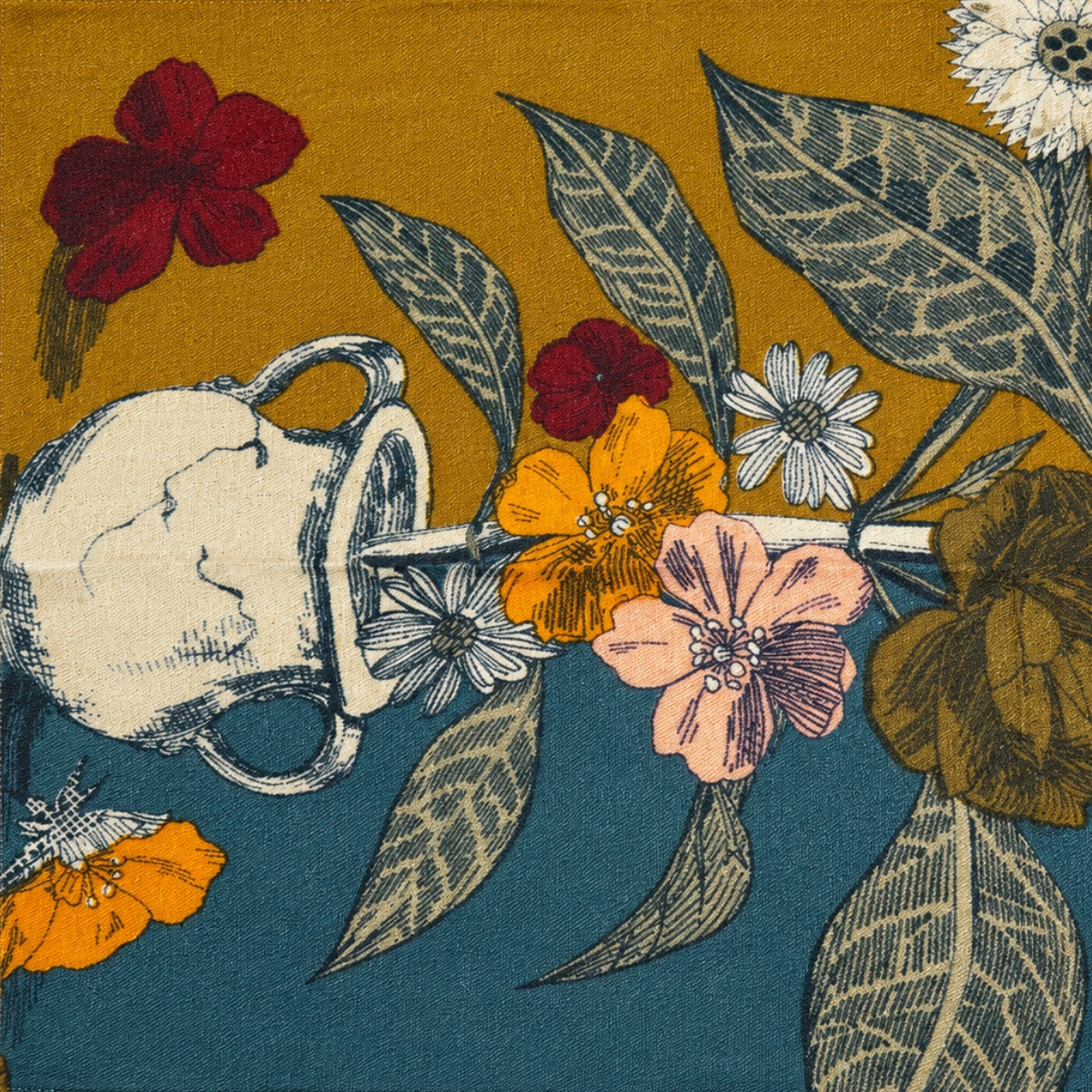 Close-up of the scarf's teal end, showing burgundy and cream florals against the deep blue ground