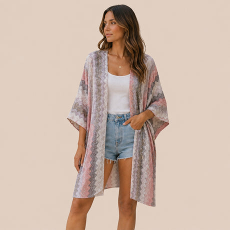 Front view of model wearing You & Eye soft mauve chevron open-knit short kimono styled over denim shorts and white tank top
