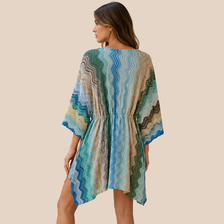 Back view of You & Eye blue and green wave-knit short kaftan highlighting the gathered elastic waist detail